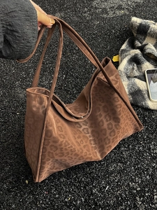 Large leopard print suede tote bag with brown shoulder straps for casual commuting