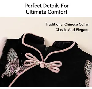 Detail of mandarin collar and butterfly embroidery on a girls' traditional Chinese outfit