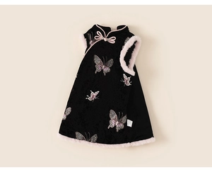 Detail of Chinese style dress featuring butterfly embroidery and pink faux fur trim