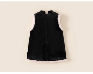 Detail of black velvet sleeveless vest with soft pink faux fur trim and mandarin collar