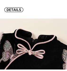 Close-up of velvet collar with pink trim, bow pearl button, and butterfly embroidery