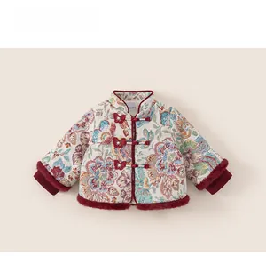 Detailed view of traditional Chinese floral embroidery and red butterfly knots on jacket