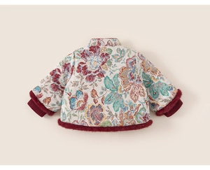 Detail of Chinese style floral jacquard cotton coat with festive red faux fur trim