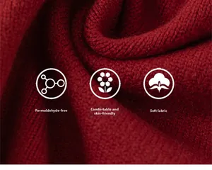 Gros plan sur la texture du tricot rouge foncé montrant le tissage doux et épais