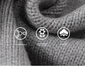 Macro view of soft grey knit fabric with V-pattern, skin-friendly and formaldehyde-free