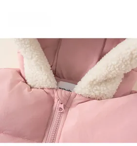 Detail view of pink quilted children jacket with thick fleece lining and durable zipper