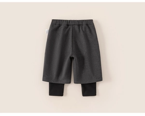 Detail of layered toddler leggings with dark grey knit shorts and black fitted inner leg