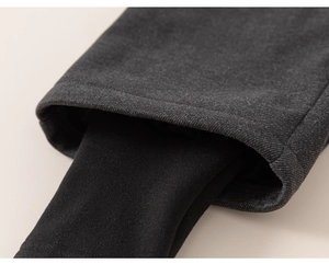 Detail of children's grey thermal leggings showing thick double-layer fabric and inner lining