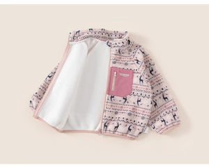 Detail of child's pink fleece jacket featuring snowflake prints and a zip pocket