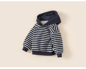 Detail of navy striped hoodie for kids featuring ribbed cuffs and soft cotton texture