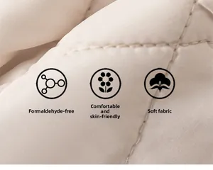 Close-up of cream quilted fabric detailing soft texture and skin-friendly material