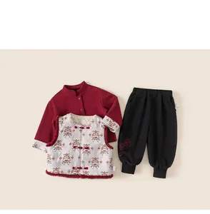Flat lay of Chinese New Year boy's three-piece set with lion dance embroidery vest