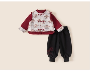 Detail of traditional Chinese vest with lion dance motif and embroidered joggers