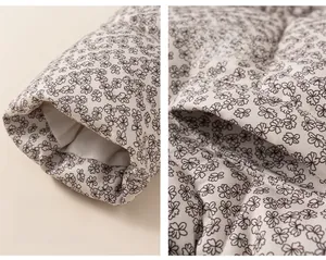 Detail view of floral cotton jacket featuring comfortable cuffs and side pockets