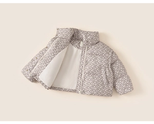 Detailed close-up of girls' floral padded jacket showing thick lining and stand collar