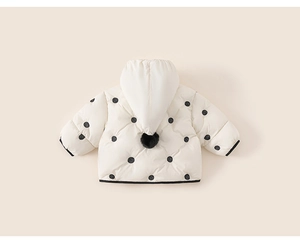 Close-up of baby polka dot hooded puffer jacket with cute black pom-pom detail