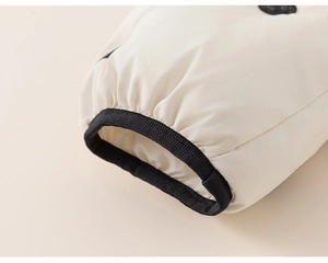 Detail of white padded jacket cuff with black elastic windproof ribbed wristbands