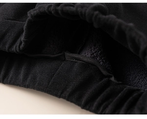 Detail of boys' thermal outfit with elastic cuff and thick black fleece lining