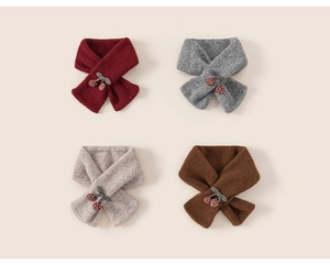 Detailed view of kids knit scarves with cherry decor in red, grey, beige and brown