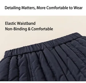 Close-up of flexible elastic waistband on kids' navy quilted thermal winter pants