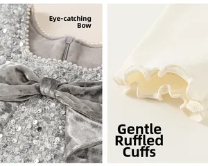 Detail of tweed dress with sequin fabric, velvet bow, pearl neckline, and lace cuffs
