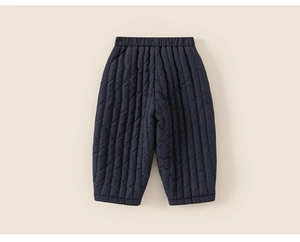 Close-up of kids navy blue quilted thermal pants with elastic waistband and stripe pattern