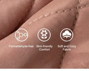Detailed macro view of soft quilted pink fabric with premium diamond stitching patterns