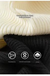 Macro shot of vertical rib knit texture in cream and black for children's dress
