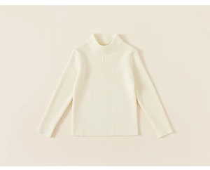 Detail of cream rib-knit turtleneck sweater for girls featuring high-quality elastic fabric