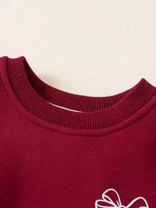 Sweat-shirt enfant bordeaux avec doublure polaire épaisse et motif nœud imprimé