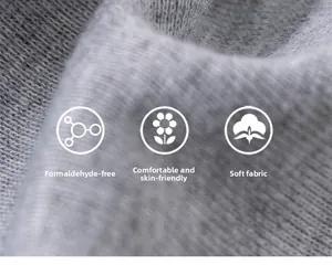 Detail of soft gray knitted fabric showing premium texture and skin-friendly material