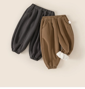 Detail showing thick white fleece lining inside children's corduroy winter trousers