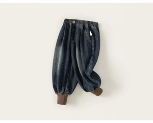 Detail of dark wash denim joggers with elastic waist and ribbed knit ankle cuffs