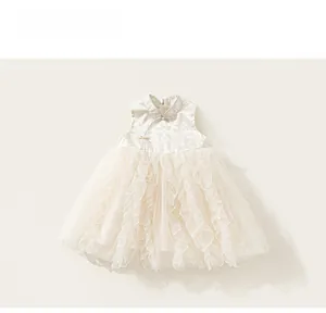 Detail of girls' cream mesh cake dress featuring traditional jacquard collar and tulle layers