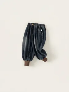 Dark blue boys denim harem pants with elastic waist and coffee ribbed cuffs