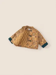 Quilted kids ginger cotton coat with traditional pattern and green frog button details