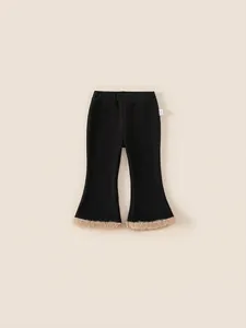 Pantalon évasé noir en maille côtelée pour fille avec doublure polaire et bords en fourrure
