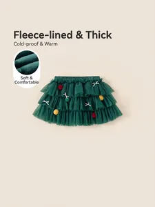Winter girls dark green tulle tutu skirt with colorful pom-poms and warm fleece lining