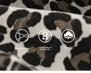 Close-up of leopard print fabric detail showing soft texture and skin-friendly material