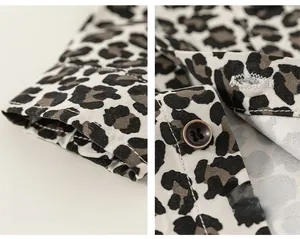 Detail of leopard print kid's shirt showing high-quality cuff stitching and button design