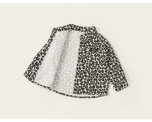 Detailed view of leopard print kids long sleeve shirt with front pocket and buttons