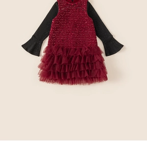Detail of girls burgundy sequin vest dress with tiered mesh skirt and black trumpet sleeves