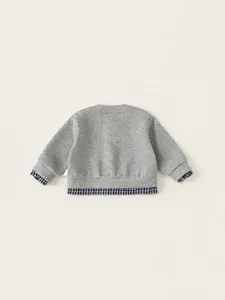 Girls gray sweatshirt with blue plaid patchwork collar and hem on clean background