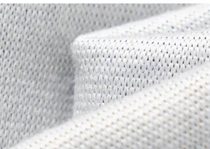 Macro shot of light blue knit fabric texture for boys casual two-piece spring outfit