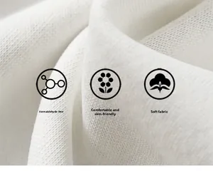 Macro detail of breathable white knit fabric with soft, skin-friendly texture