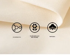 Close-up of soft, formaldehyde-free cream textile fabric with a smooth skin-friendly texture