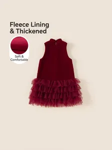 Girl's thick red knit dress and tulle tutu two-piece set for winter celebrations