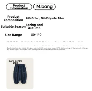 Detail view of boys' deep blue denim jogger showing 70% cotton fabric and pocket stitching