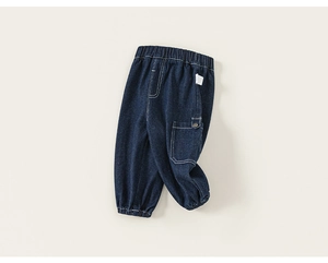 Detailed view of kids dark blue denim joggers with elastic waist and cargo pocket