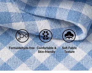 Macro view of blue and white checkered cotton fabric with soft woven texture details